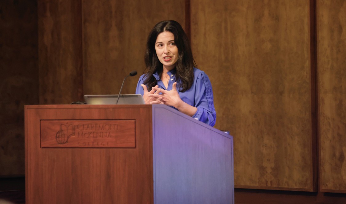 Professor Lisa Koch presenting at P. Edward “Ed” Haley's memorial.