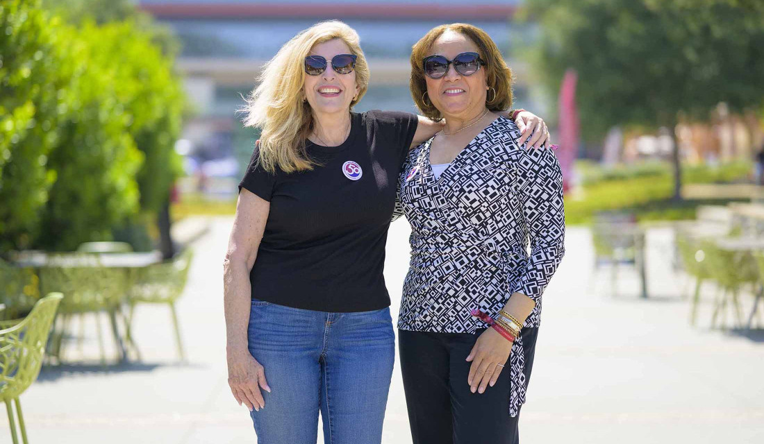 Mari Adam and Lorraine Bains on campus