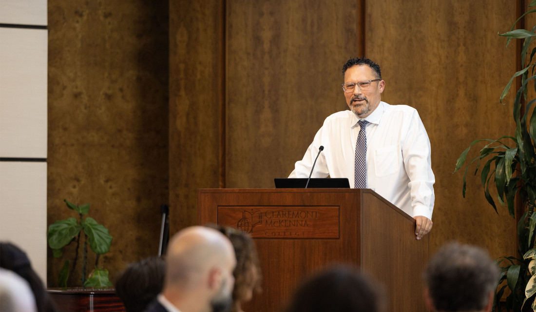 Prof. Nick Buccola at podium