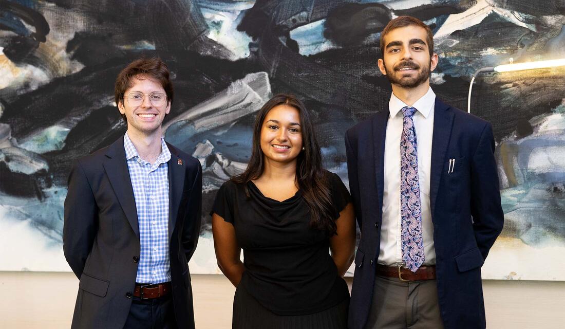 2026-27 Ath Fellows: Jasper Langley-Hawthorne ’27, Ambika (Bika) Gupta ’27, and Shivom Parihar ’28 standing in the Ath