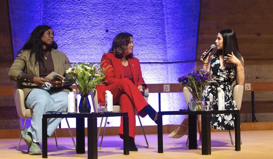 Malu Junco '27 on stage with two other women
