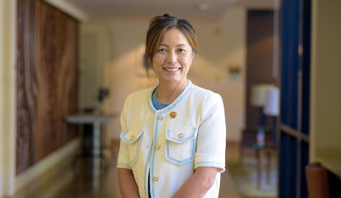 Stella Ho '97 in the Ath lobby