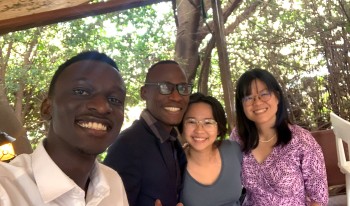 To aid in establishing the first liberal arts college in Uganda, Takako Mino ’11 (right) has created an internship pipeline of CMC students, including Sik Wan Poon ’26 (center).