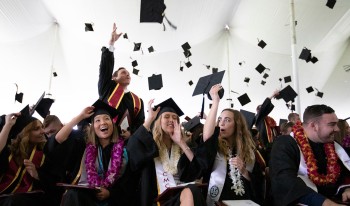 graduates celebrate