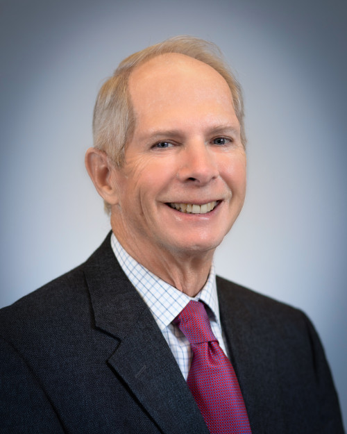 Present day Dale Jacobs '66 in suit and tie.