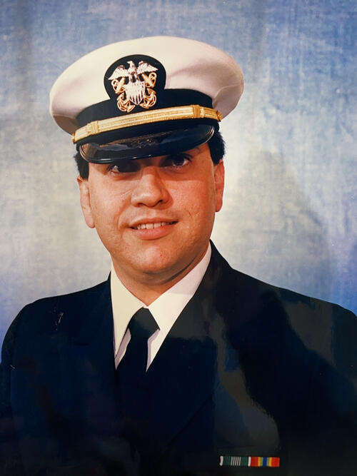 Man in military uniform posing for a photo. 