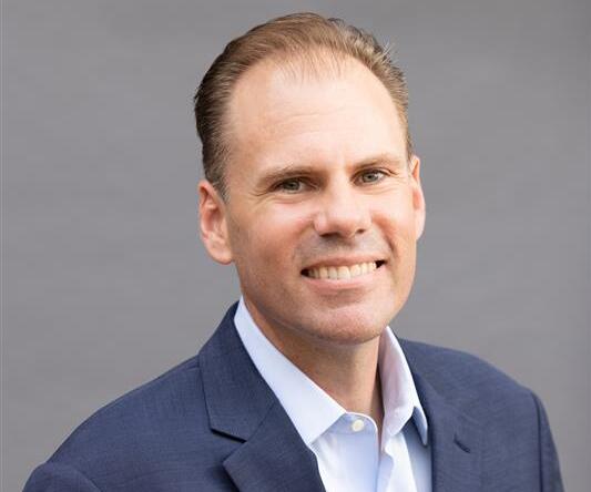 Headshot of Steven Powell.