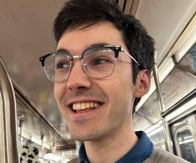 Headshot of Zachary Horvitz.