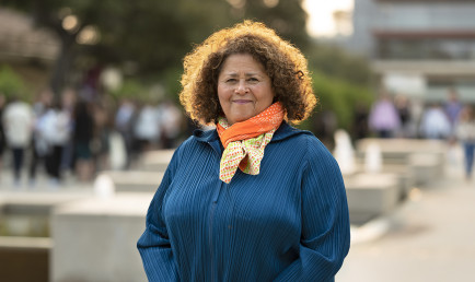 Anna Deavere Smith smiles for the camera outside of the Athenaeum