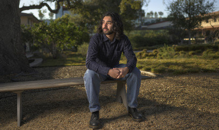 Portrait of Wali Shaikh '24, Seaver Scholar, on campus.