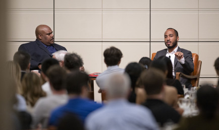 Prof. Fortner and Coleman Hughes in discussion at the Ath