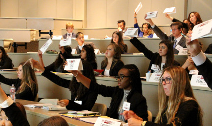 High school student delegates take part in the McKennaMUN Conference.