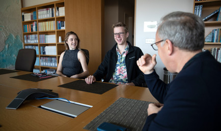 Professor meets with students