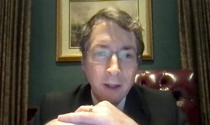 Screen capture of Richard Lowry, editor of National Review and a conservative pundit, speaking at virtual Ath.