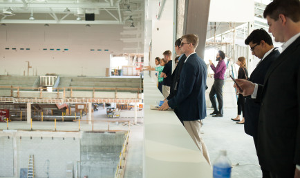 HEART OF THE PAVILION: Alumni view the Roberts Pavilion's central court.