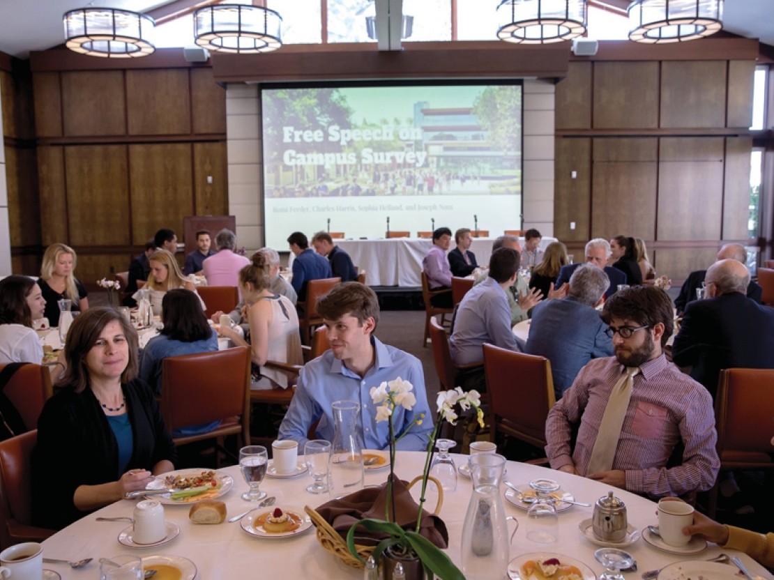 students and professors at the conference