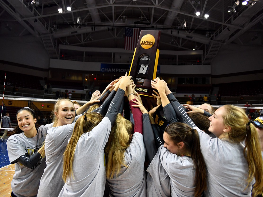 Athenas raise championship trophy