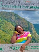 Photo of Aishat Jimoh at a photo opp at Afadjato, Africa's highest peak.