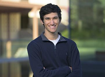Nicolas De Mello ’23 photographed on campus in front of the Kube.