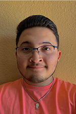 Romel Pacheco (he/him/his)